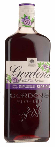 Classic style bottle with label stating the Gordon Sloe Gin spirit wine vintage by Diageo PLC from Scotland.