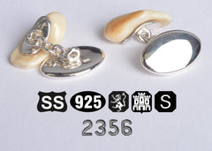 Pair of whitey yellow polished red deer ivory tusks, in sterling silver with full hallmarking’s & numbering displayed below.